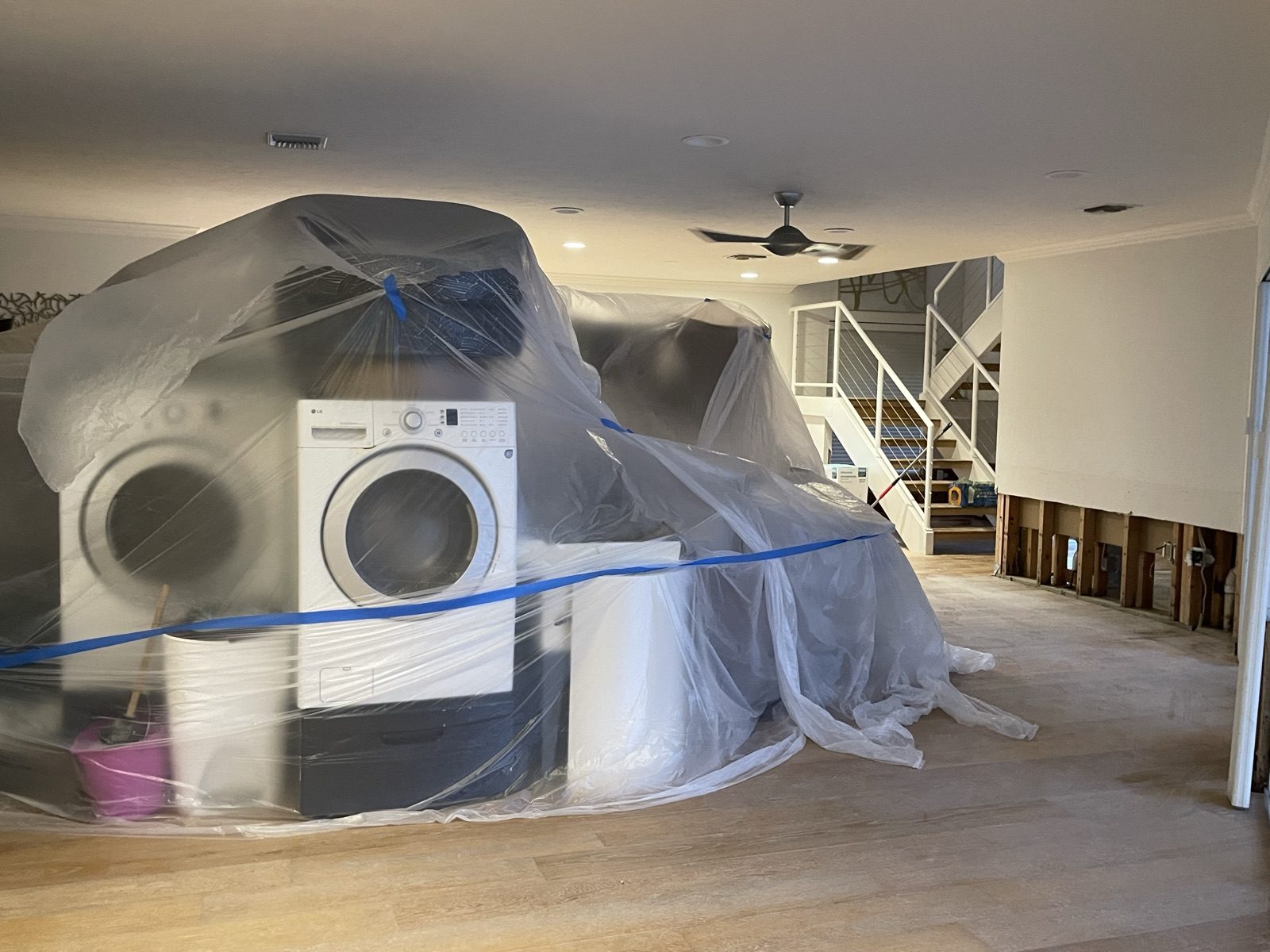 Wide view of a property protected and being dried after water damage